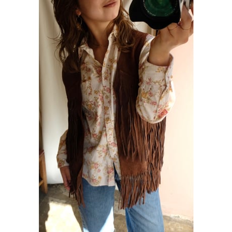 brown leather vest