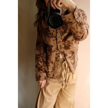 brown flower shirt