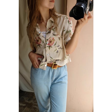 beige flower shirt