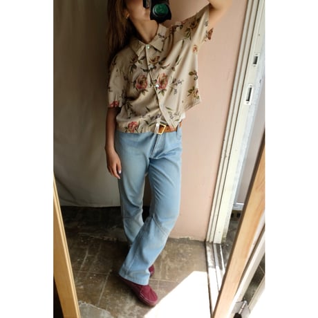 beige flower shirt