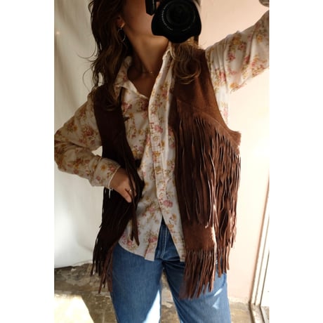 brown leather vest