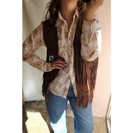brown leather vest