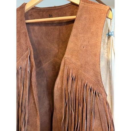 brown leather vest