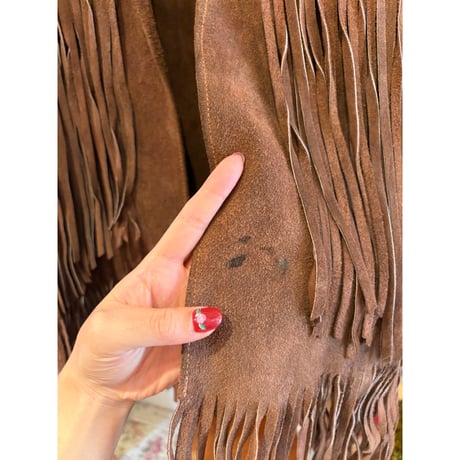 brown leather vest