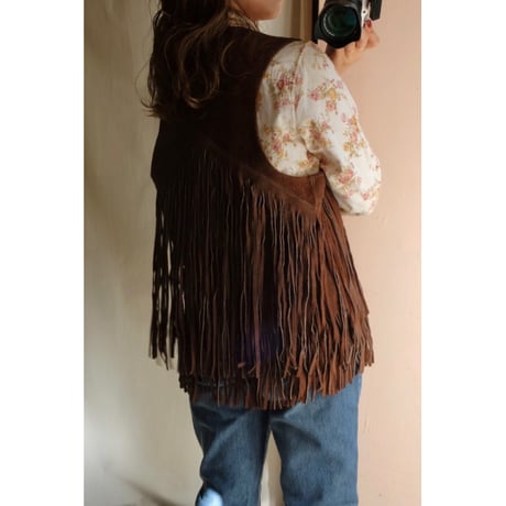 brown leather vest