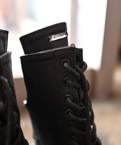 k.j dan "Lace up high heel sneaker"