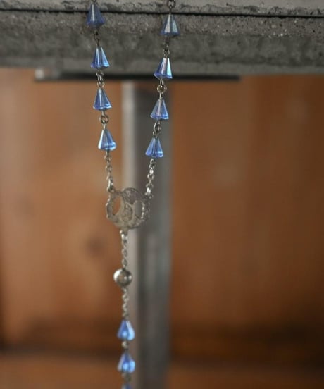 Subtle "Jesus christ" Skeleton blue glass beads.