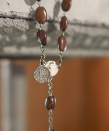 Subtle "Jesus christ" Brown wood beads.