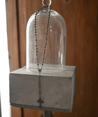Subtle "Jesus christ" Dark beige beads.
