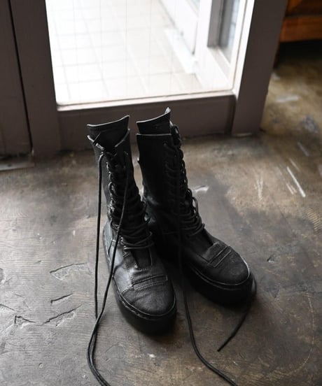 k.j dan "Lace up high heel sneaker"
