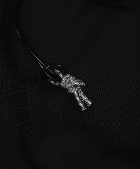 LEATHER CORD DOUBLE KNOT ORNAMENT