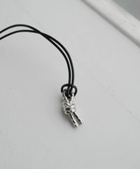 LEATHER CORD DOUBLE KNOT ORNAMENT