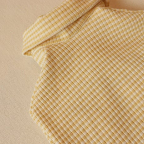 細ボーダーのリブニット（マスタード）
