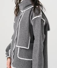 【torrazzo donna（トラッゾドンナ）】ブランケットステッチニットコート
