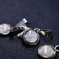 ［ペンダント］【再入荷】アルタイ隕石　銀色に浮かぶ細かな模様　7.8mm　トップのみ