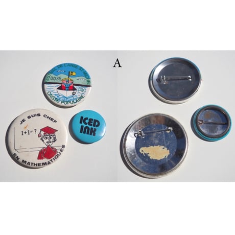 vintage tin badge
