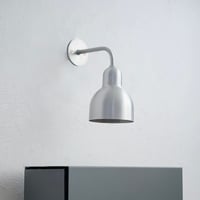 ENTRANCE LIGHT / aluminum , brass / 光が拡散しすぎず下方向をしっかりと照らすデザイン。金属なのに軽やかな存在感が建物をより魅力的に見せてくれるエントランスライト
