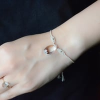 Quartz in Quartz/貫入水晶　自然染めシルク腕飾り  （五倍子染め）