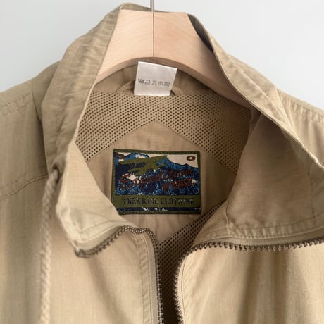 Beige utility vest