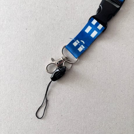 SUOMI logo neck strap