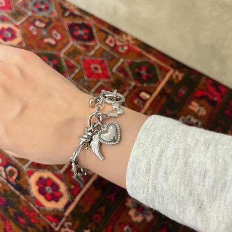charm braceletʚꨄ︎ɞ -wing-