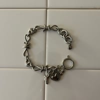charm braceletʚꨄ︎ɞ -wing-