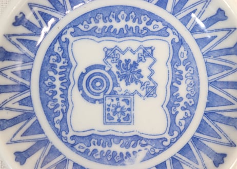 明治後期～大正銅判剣先放射文図小皿