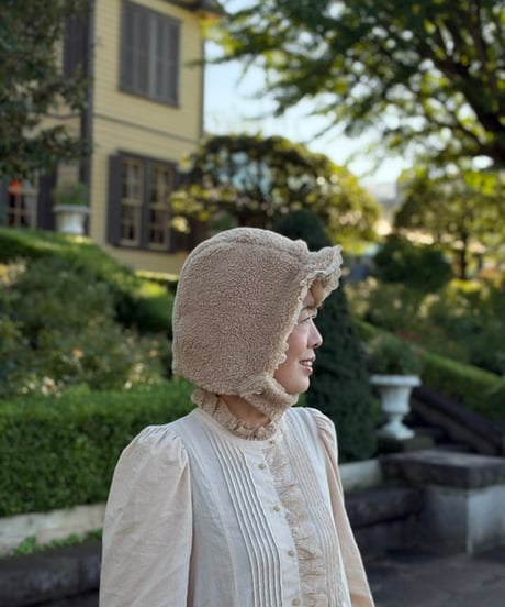 curly earflap hat