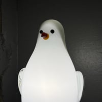 USED MILK GLASS PENGUIN LAMP