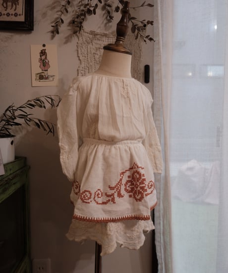 【26aw】antique  cross apron skirt