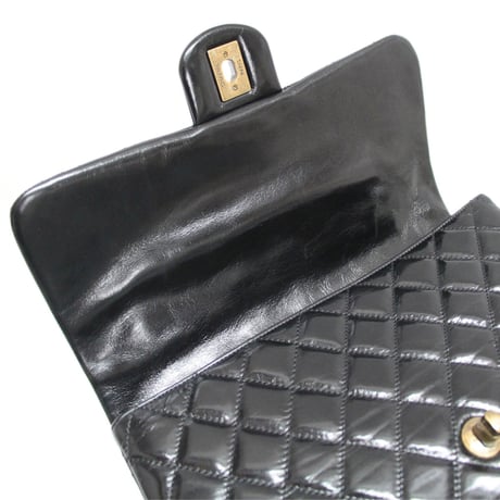 CHANEL Castle Rock Top Handle Flap Bag Quilted Glazed Calfskin Black #76356