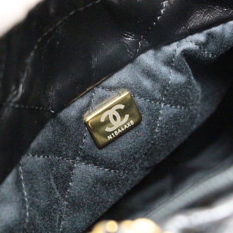 CHANEL 22 Mini Handbag Shiny Calfskin Black #76785