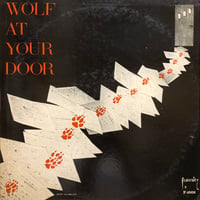 Tommy Wolf / WOLF AT YOUR DOOR