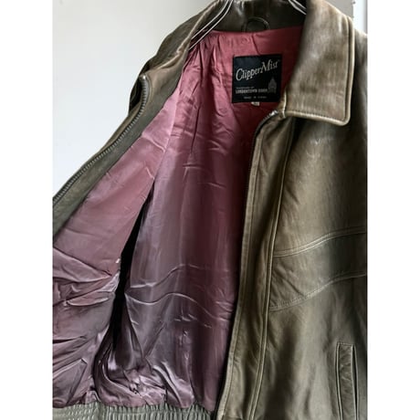 1980's-Early 1990's "Clipper Mist" Sun faded green leather dolman sleeve jacket