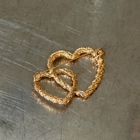 Double heart brooch