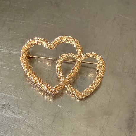 Double heart brooch