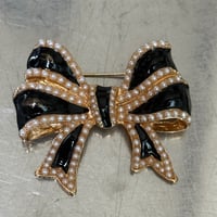 Black ribbon brooch