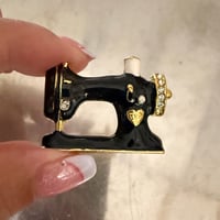 Sewing machine brooch