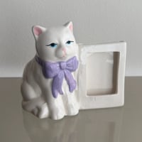 Cat stand and flame