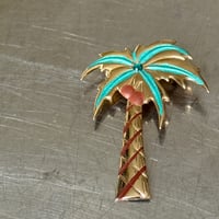 Palm tree brooch