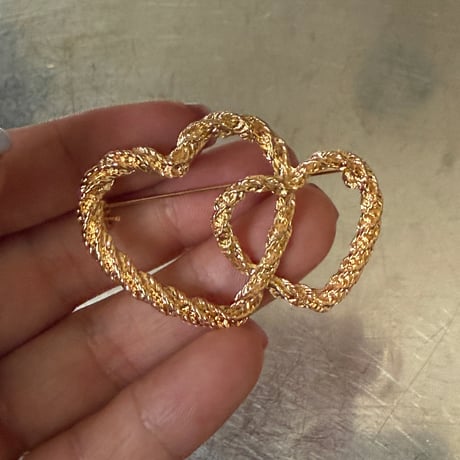 Double heart brooch