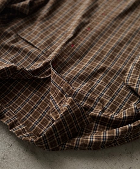 catching red button shirt