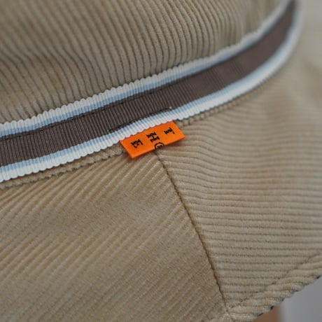 THE COLOR " CORDUROY TAPE HAT "