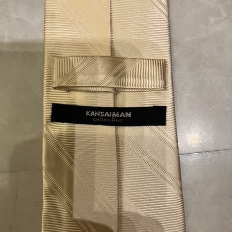 N47｜KANSAI MAN 薄ゴールドレジメンタイ