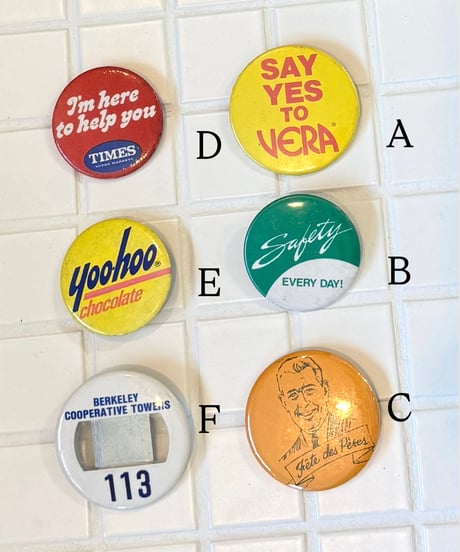 vintage tin badge