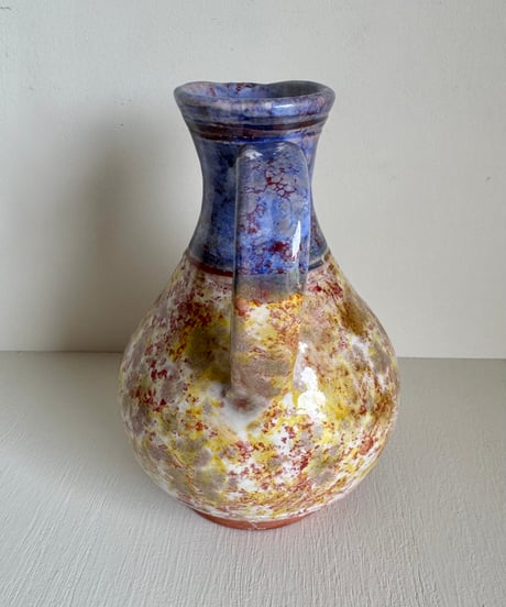 Purple & Yellow Pottery Pitcher