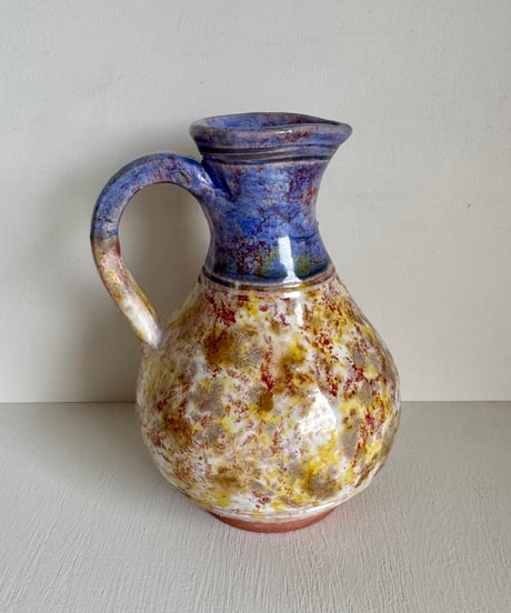 Purple & Yellow Pottery Pitcher
