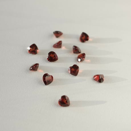 heart pierce (black zirconia/garnet)
