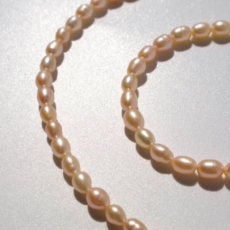 salmon pink pearl necklace (silver/gold)