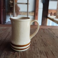 ベージュのクリーマー／HOYA